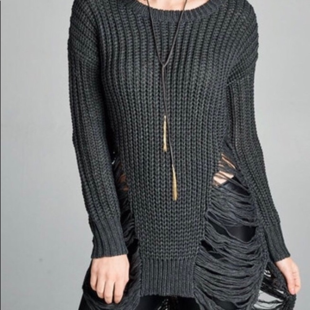 Damsel in distressed sweater